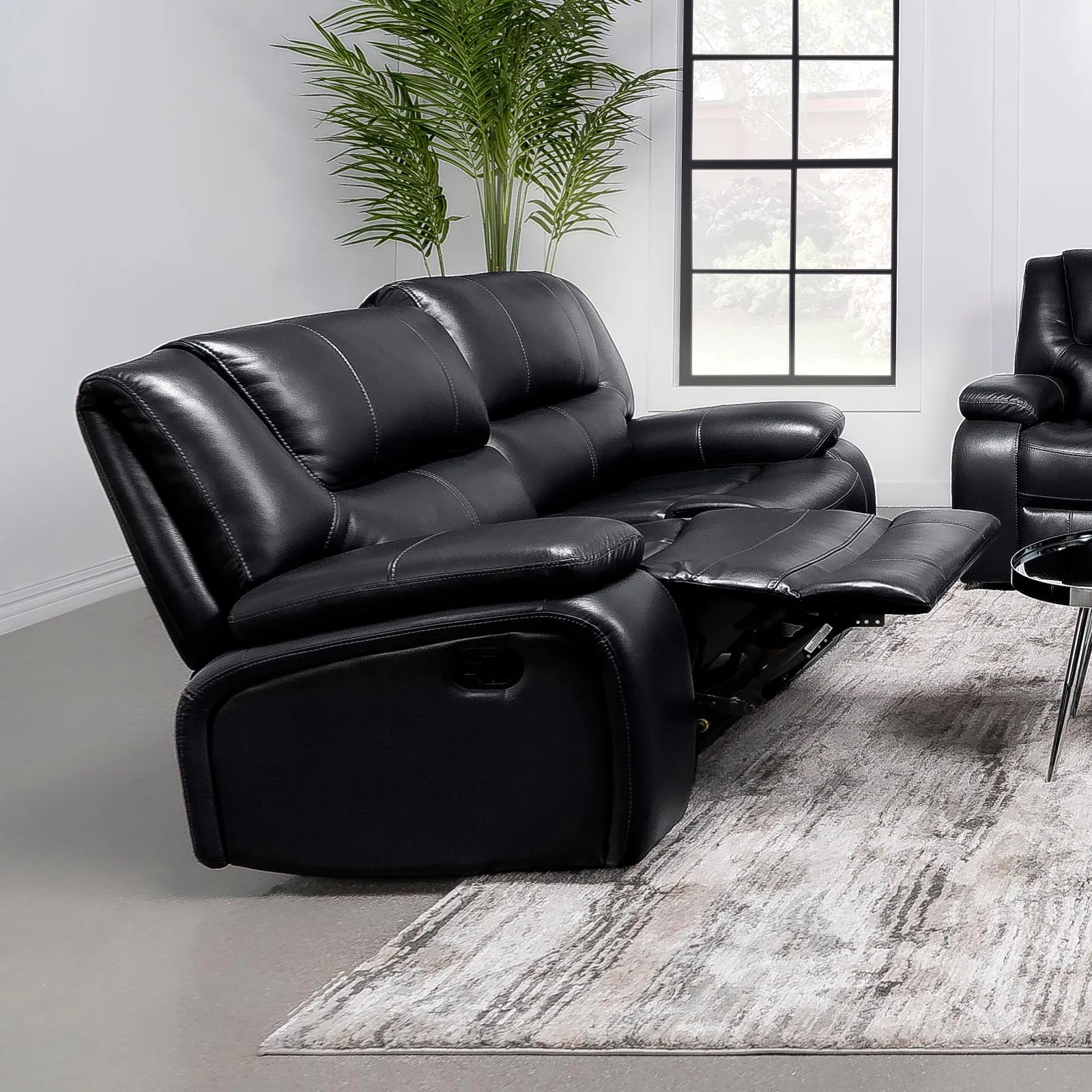 Camila Black Upholstered Motion Reclining Loveseat - Image 4