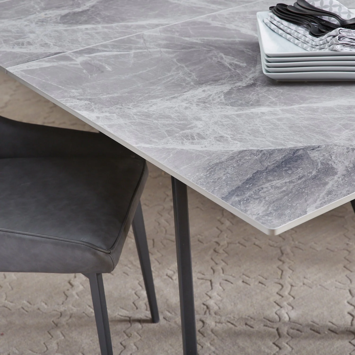 Lucia Extendable Stone Top Metal Leg Dining Table in Piedra and Black - Image 8